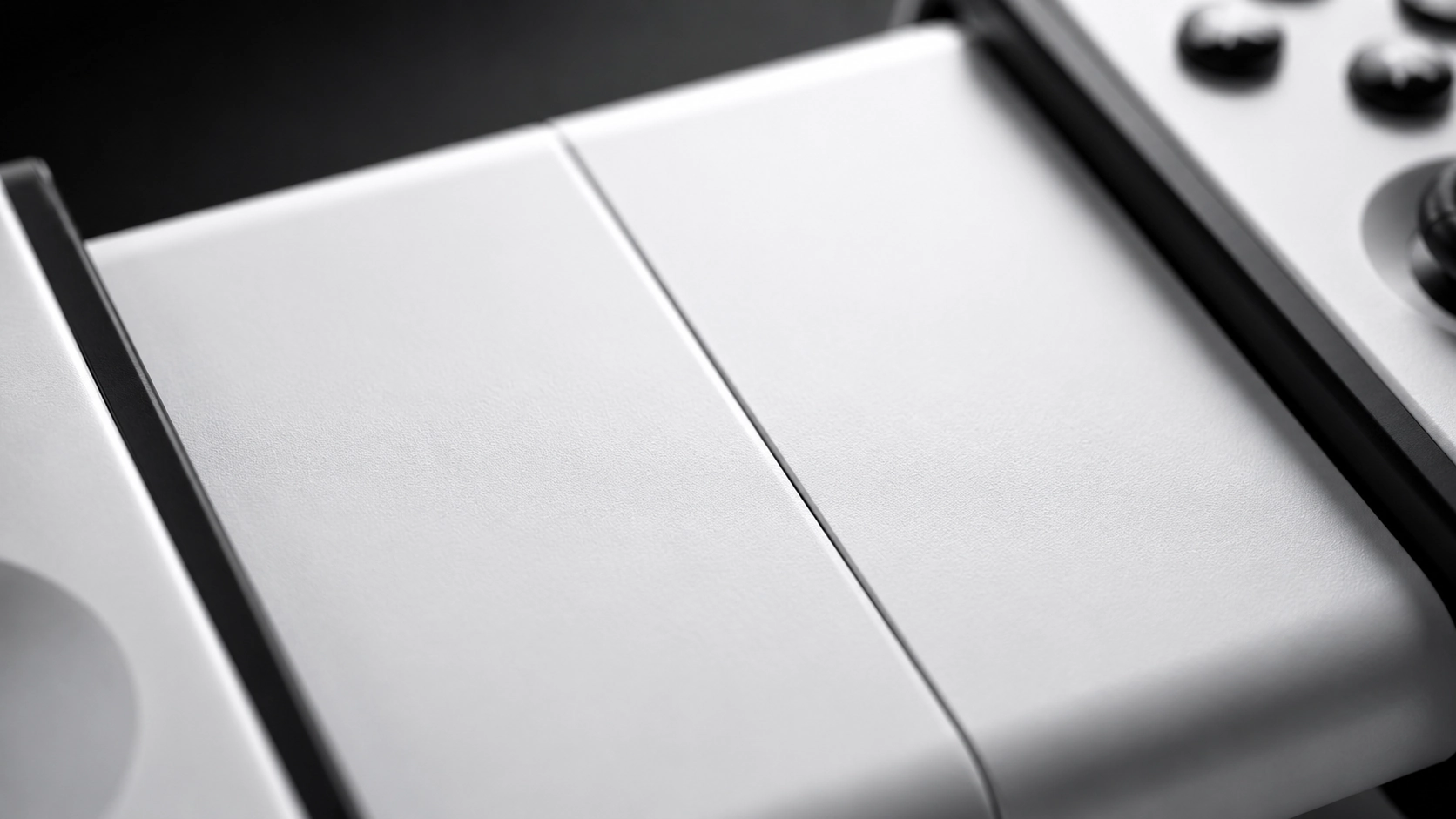 Surface texture detail of telescopic mobile gaming controller housing